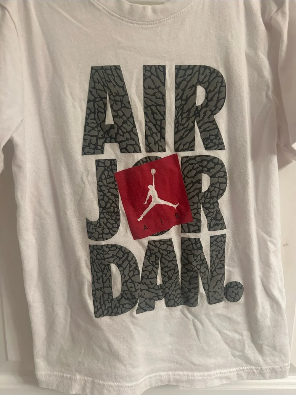 Boys Jordan White Short Sleeve Tee with Gray Graphic and Red Jumpman